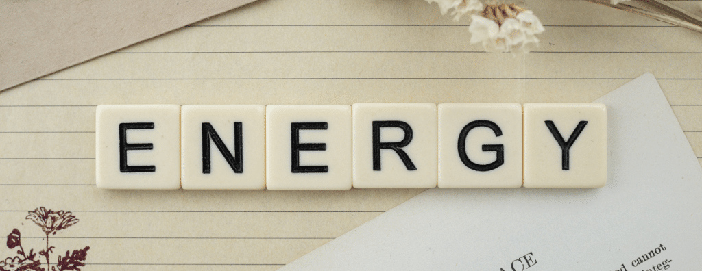 the world energy spelled out in scrabble tiles